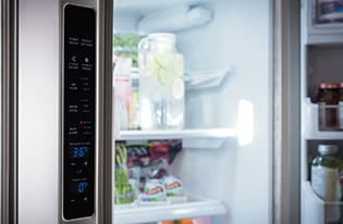 Controls on side of refrigerator door