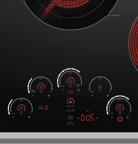 Red and white LED display with patterned black glass surface