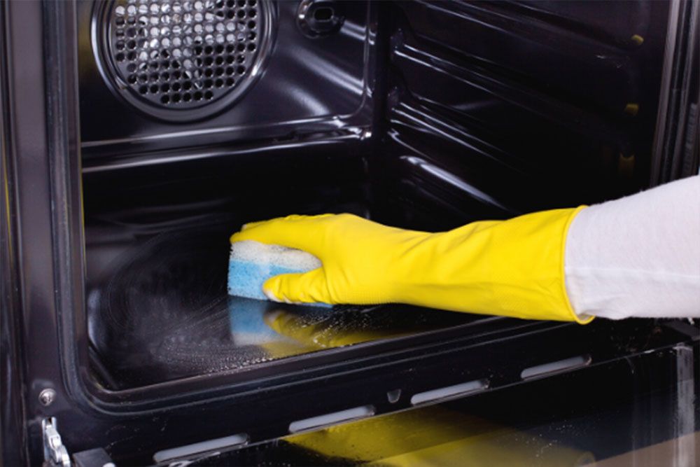 cleaning an oven
