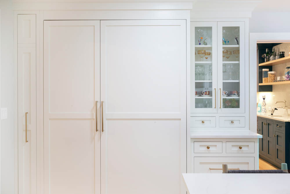 Inset framed cabinets and glass-front cabinets