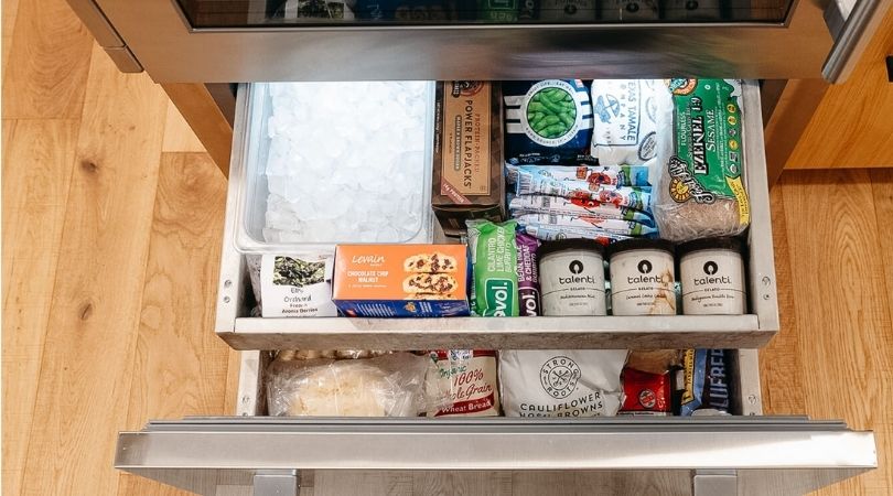 Inside the spacious freezer compartment of True's bottom mount freezer refrigerator.